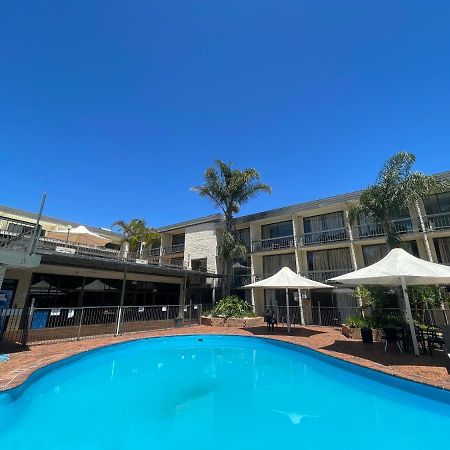 El Lago Waters Hotel Entrance Exterior photo